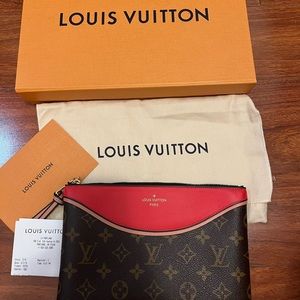 Authentic. Lv clutch po. Tuileries nm